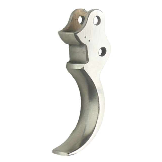 The TRIGGER STAINLESS 75, made of high-quality stainless steel, boasts a sleek, curved design with a smooth finish. It includes a rear mounting hole and angular edges, making it perfect for firearms or mechanical devices. The isolated image emphasizes its