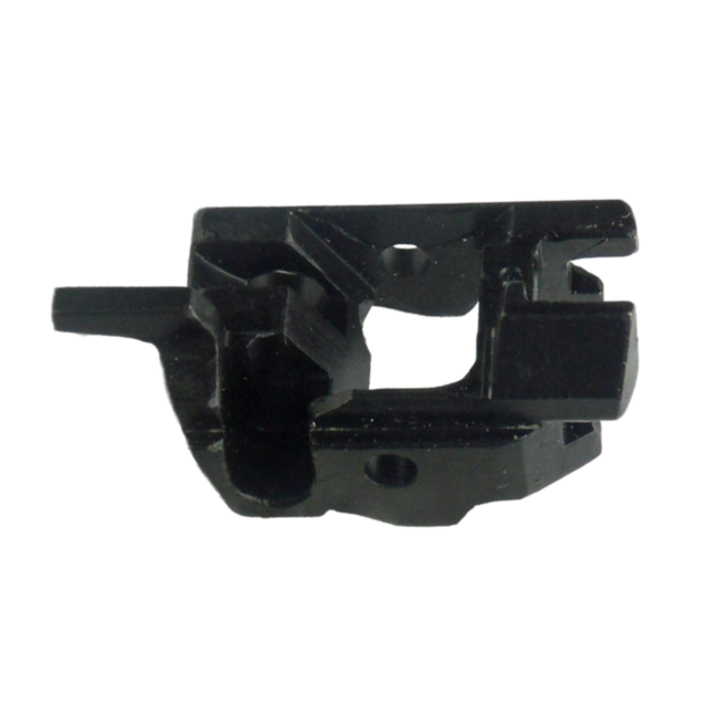 The EJECTOR 75 .40 SW AMBI SAFETY #3 is a black mechanical component with an irregular shape, characterized by multiple angles, grooves, and a central rectangular gap. It includes a hole and protruding sections, suggesting its use in machinery or equipmen