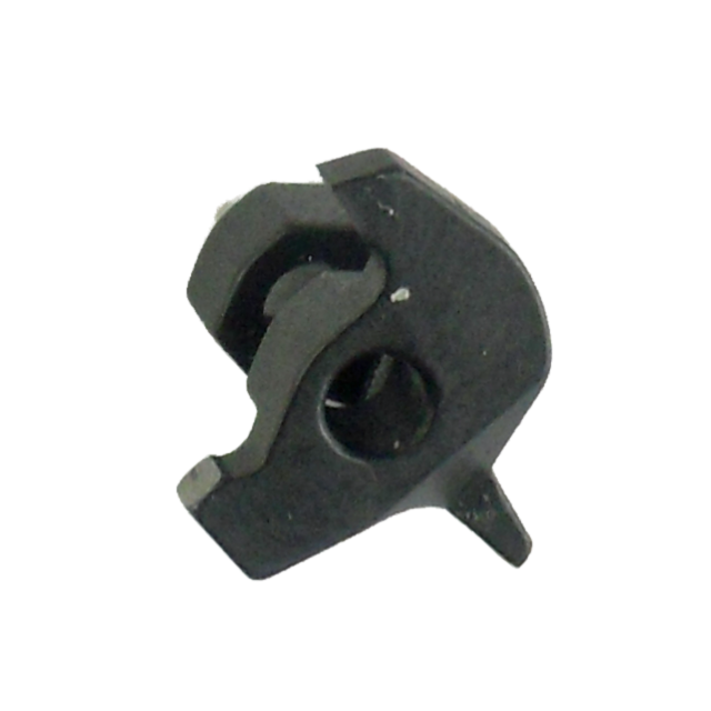 A compact, uniquely-shaped black mechanical component resembling a "B" style sear, characterized by a central circular hole and an elongated tab-like extension on one side with a slightly textured surface.