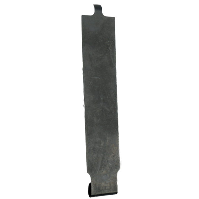 The close-up reveals the FLAT SPRING/MAG BRAKE 75/85, a metal object with a rectangular shape and notched ends, resembling a flat spring. Its surface is marked by scratches and wear, complemented by a dark, matte finish.