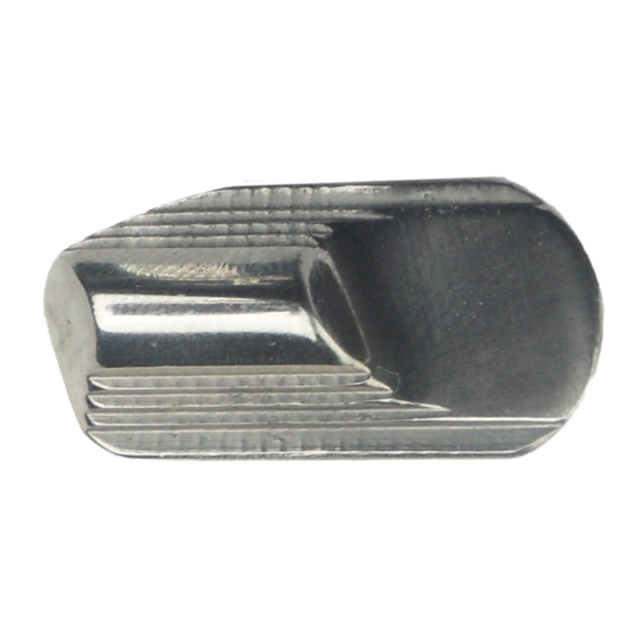 Close-up of a metallic, intricately shaped SAFETY RIGHT STAINLESS 75 with a smooth surface and geometric patterns. The object has a polished finish and features a curved indentation on one side, resembling a precision-engineered part crafted for durabilit