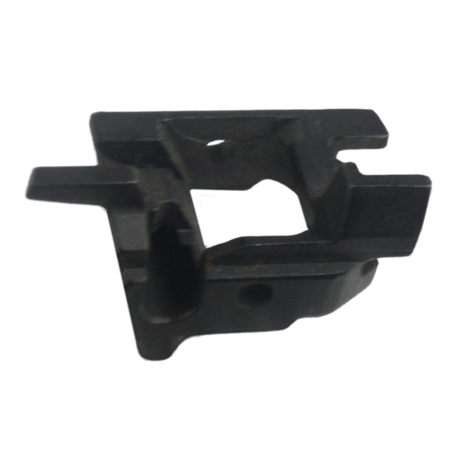The object is a black, irregularly shaped plastic component featuring multiple notches and protrusions, resembling a tactical bracket. It appears to be part of mechanical or electronic assemblies, with a matte, rugged surface indicative of the durable des