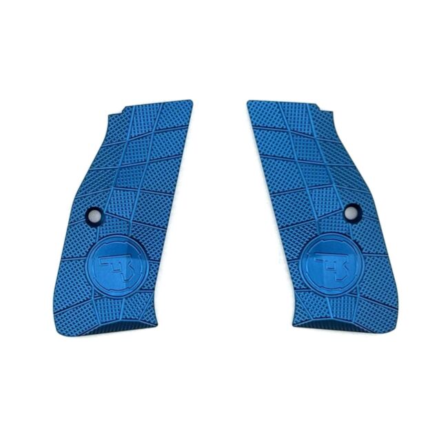 Two blue LOK Grips Shadow 2 Palm Swell GridLOK + CZ Logo panels, made of full-length aluminum with a grid texture and palm swell. Each mirrored grip features a screw hole and circular "CZ" logo. Placed side by side.