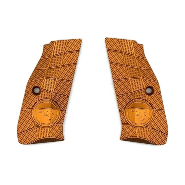 Two orange aluminum LOK Grips Shadow 2 Palm Swell GridLOK grips with a CZ logo, full-length design, and checkered texture are shown side by side on a white background.