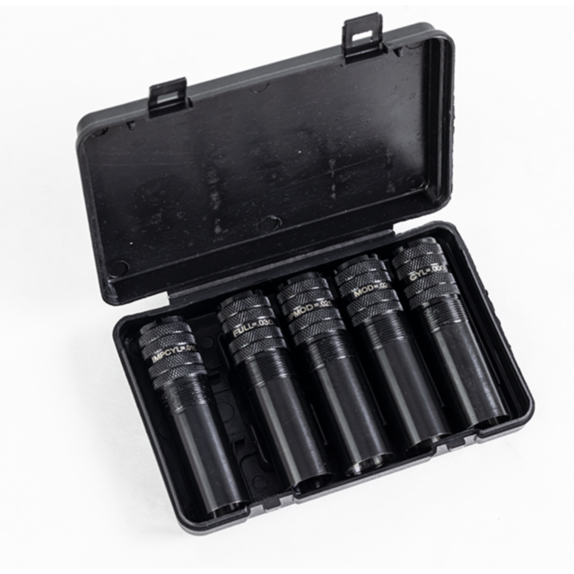 The black plastic case contains the CHOKE TUBE SET, EXTENDED BLACK 12GA, which includes five neatly arranged cylindrical chokes in black metal. Each choke is marked with distinctive inscriptions and detailed grip patterns to ensure precise performance. Th