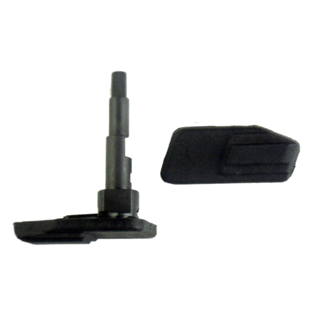 Close-up of a black folding plastic fob with two distinct components, designed similarly to the CZ P-07/P-09 Safety Set. One section is a small, elongated rectangle with a textured surface, while the other boasts a protruding cylindrical segment.