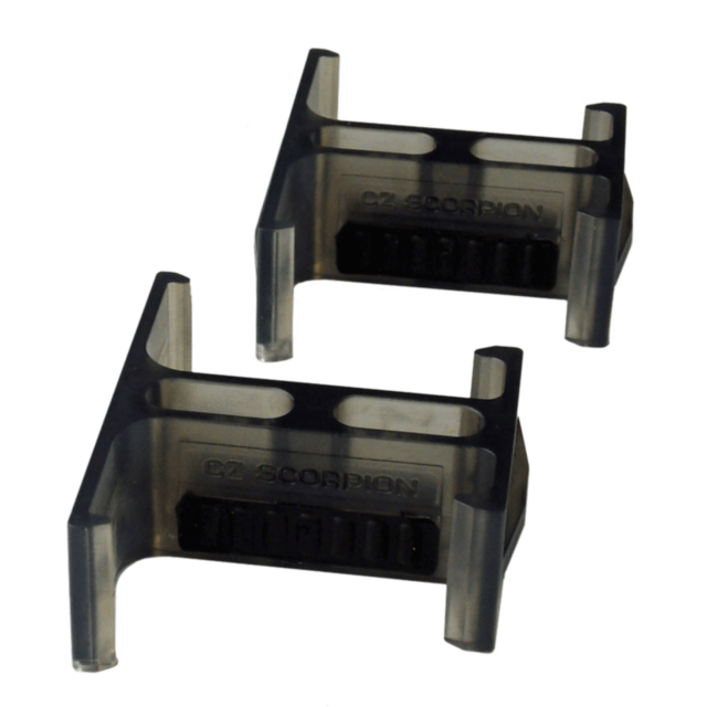 Two CZ Scorpion Magazine Couplers made of plastic are displayed. They are transparent, with a dark central section featuring "CZ Scorpion" text on each. These couplers sit against a plain background, emphasizing their sleek design and functionality.