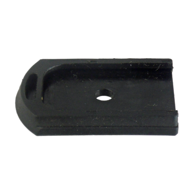 The MAGAZINE BASE CZ100 RAMI FLUSH is a small, black, rectangular plastic component featuring a rounded end and a central hole, crafted to provide the magazine with a sleek and flush finish.