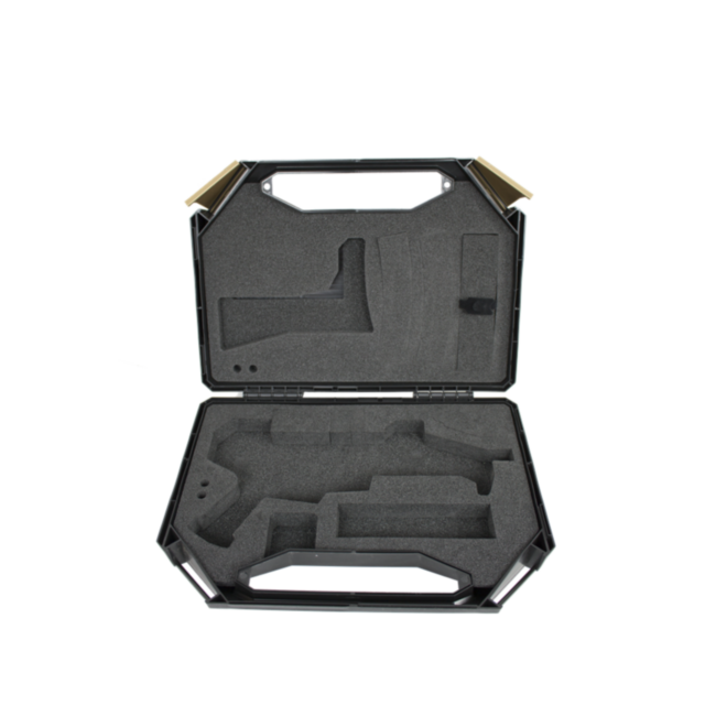 The CZ SCORPION EVO PLASTIC CASE is an open black plastic carrying case featuring custom gray foam inserts, specifically designed to securely hold the CZ Scorpion EVO and other items. The foam compartments are precisely shaped to fit these objects, ensuri