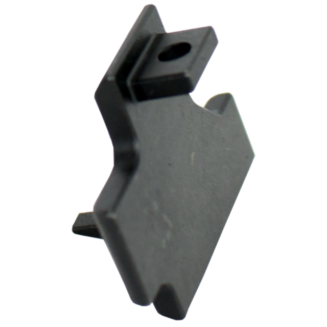 A close-up image of the BOLT RELEASE 805 features a black plastic panel with a protruding tab that includes a small hole. The panel, crafted for bolt release functions, showcases ridged edges and an angular design. Its intricate shape and features are hig