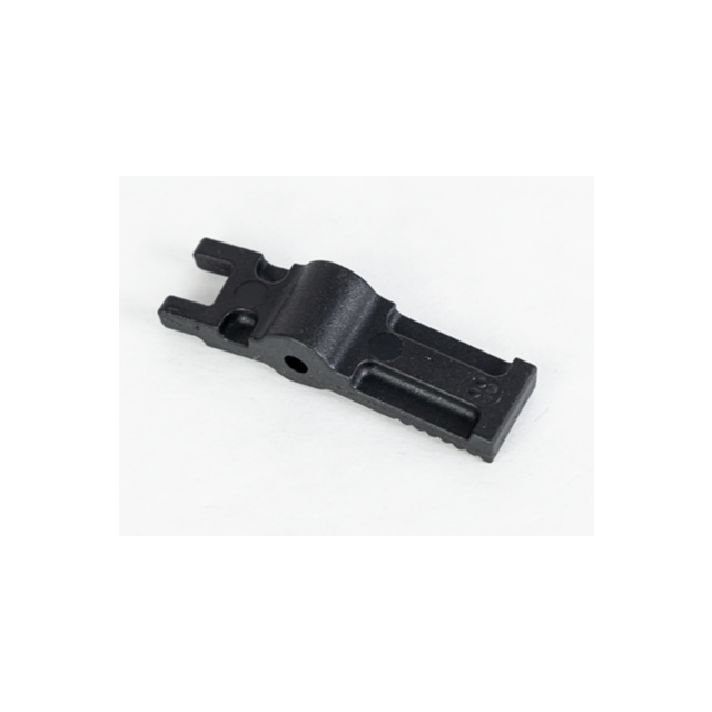 The REAR HEAD DETENT LEVER BREN 2 STOCK, featuring a black plastic or metal construction with a rectangular base, two elevated arms on one end, and a central raised section containing a hole, is positioned against a white background. This suggests its use