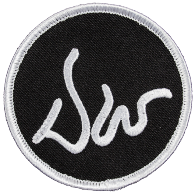 The DAN WESSON 3" PATCH, BLACK features a stylized "SW" logo embroidered in white cursive script, set on a black circular background with a contrasting white border, evoking the elegance associated with Dan Wesson designs.