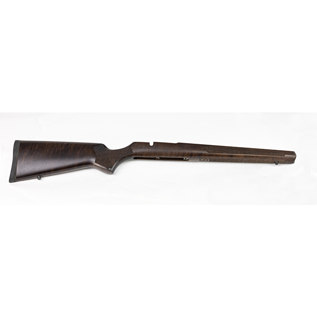 The CZ 457 STOCK VARMINT LACQUERED showcases a contoured design perfect for the CZ 457, with a smooth and dark brown lacquered finish. It includes slots for attaching the barrel and mechanism, all displayed against a plain white background.