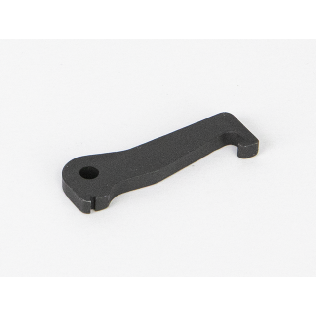 A small, flat, black metal tool with a hook-like end and a circular hole on one side rests on a plain white surface. Its design indicates it could pair well with the 512 HAMMER NEW STYLE for mechanical purposes or adjustments.