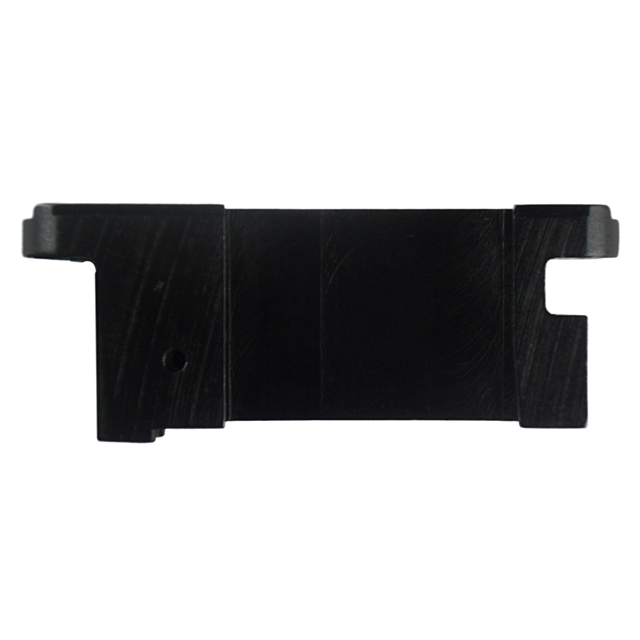 The MAGAZINE HOUSING WMR MODIFIED is a black rectangular plastic bracket possibly designed for mounting or support. It includes two protruding tabs on each end, has a smooth surface with slight textural lines, and features a small circular hole on the lef