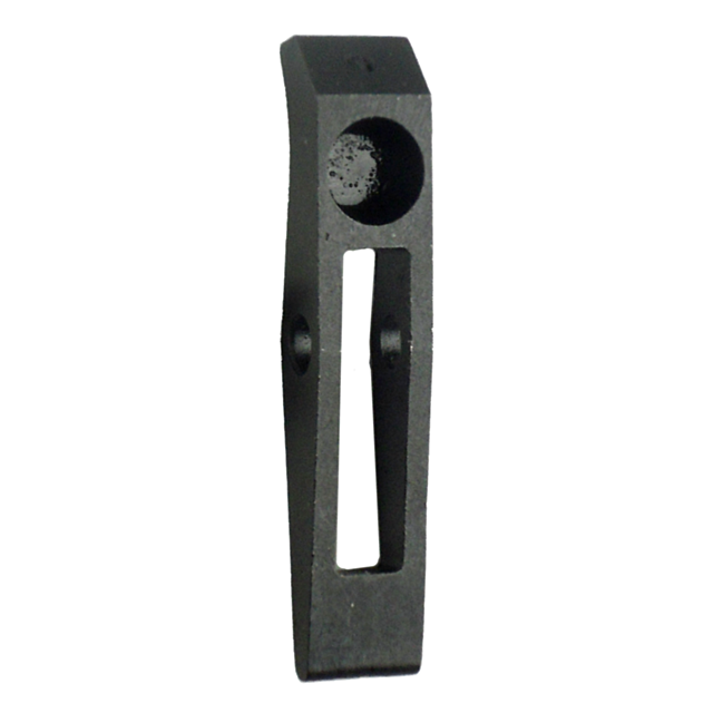 The MAGAZINE CATCH 452/455/512 is a black, elongated metal piece featuring a rectangular cutout and a circular indentation at one end.