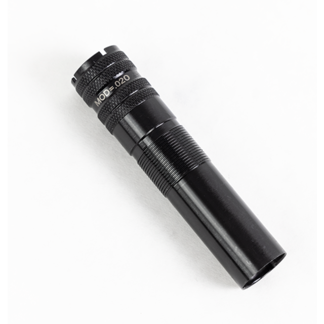 A black flashlight with a textured grip lies at an angle on a white surface, featuring the text "1012 M Choke" near the top.