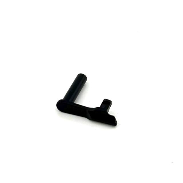 The DWX SLIDE STOP 9MM, DUTY COAT is a compact black L-shaped metal piece, featuring a cylindrical handle and a flat, angled base designed for effective slide stopping. Positioned against a simple white backdrop, it enhances the modern aesthetic of the 9m