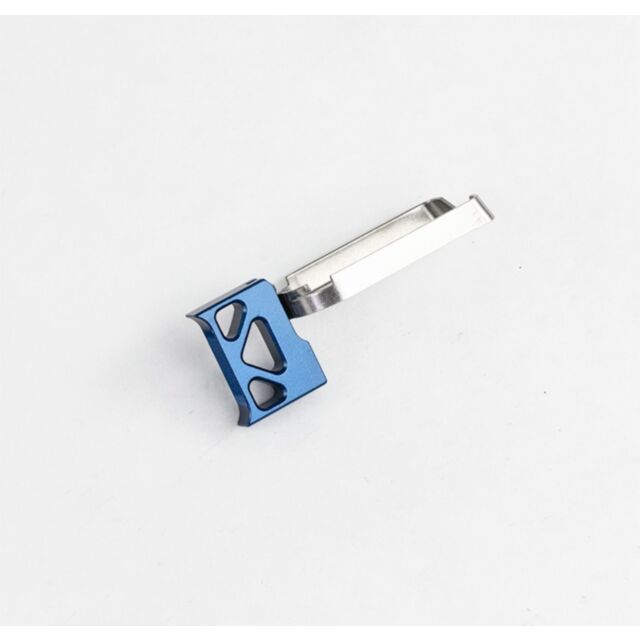 A product labeled DWX Full Size Trigger Assembly in blue, featuring a silver metallic clip with a triangular cutout design, isolated on a white background.