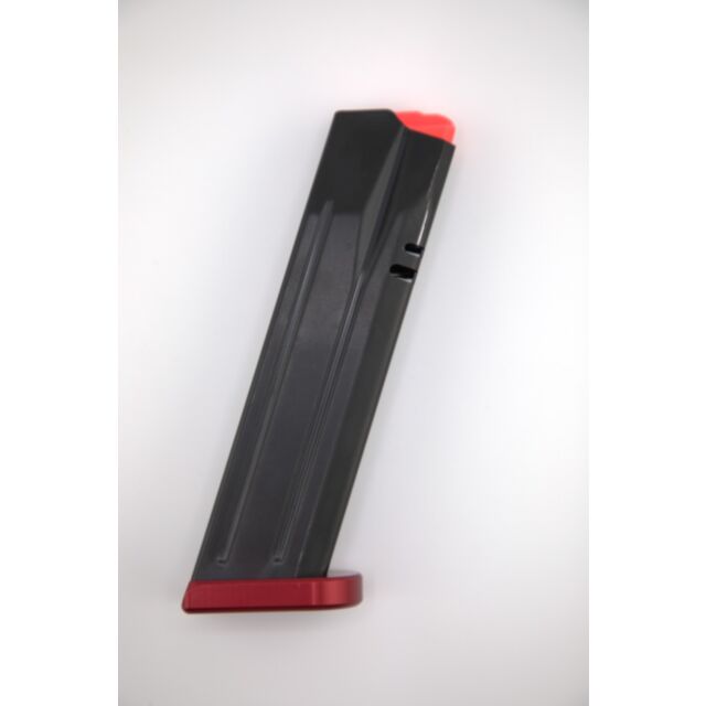 A black firearm magazine with a red base is placed vertically against a white background.