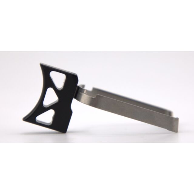 A close-up image of the DWX COMPACT TRIGGER ASM, CURVED K, BLACK featuring a unique geometric design in black and silver metal, shown against a plain white background.