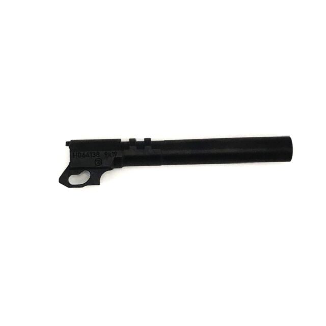 Image of a black BARREL SHADOW 2 9MM and slide from a firearm on a white background. The left portion includes a gear-like notch, with the numbers "HD64138 9x19" inscribed on the side.